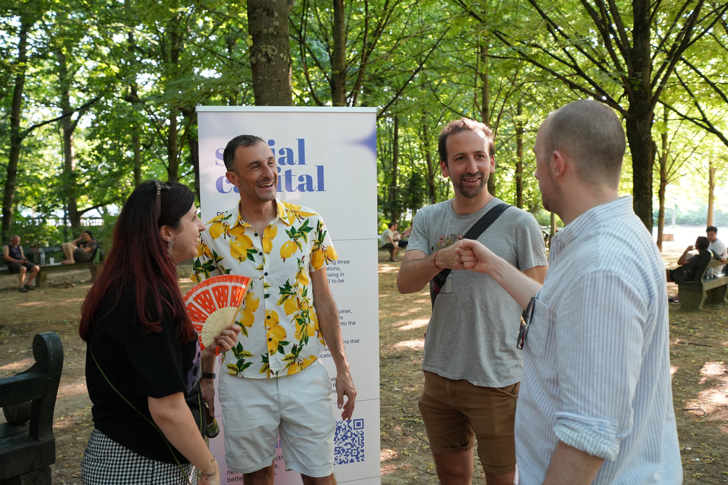 Conversations in the park at Commschella 2026